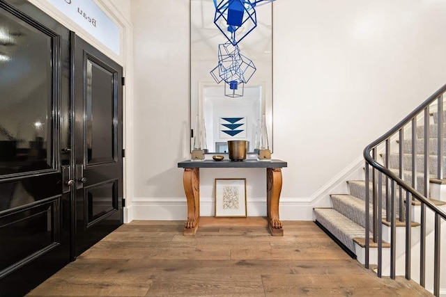 foyer with hardwood / wood-style flooring