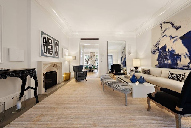 living room featuring crown molding and wood-type flooring