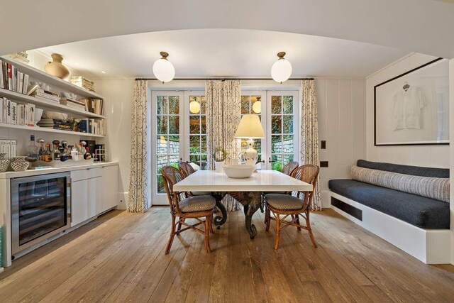 carpeted bedroom with a fireplace and ornamental molding