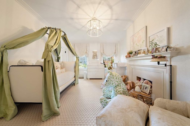 living area featuring crown molding, light colored carpet, a fireplace, and a chandelier