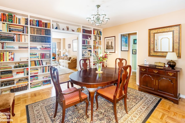 dining space featuring a chandelier