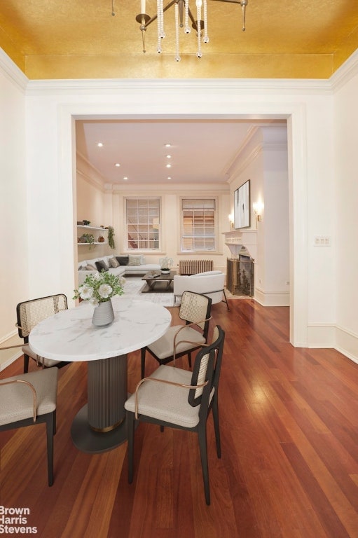 dining area featuring hardwood / wood-style flooring