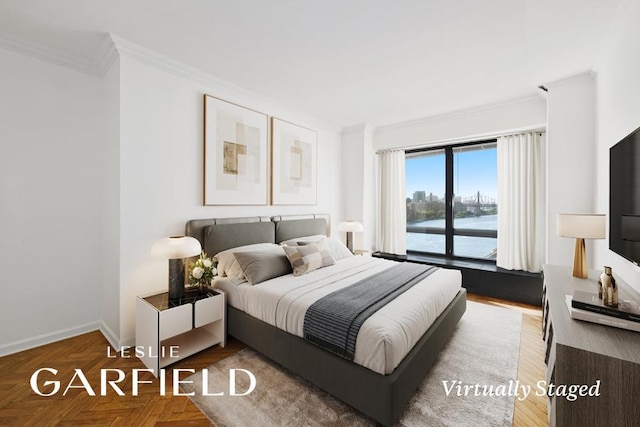 bedroom featuring baseboards, access to exterior, and crown molding