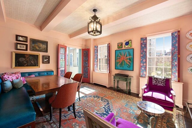 45 E 9th St Unit 45, New York City, NY 10003 - dining area featuring beam ceiling and baseboards