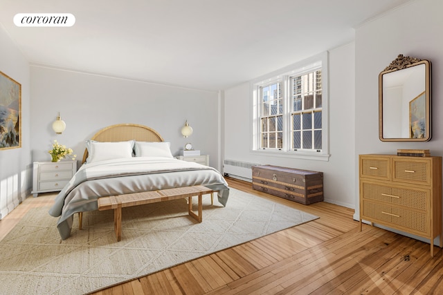 unfurnished living room with coffered ceiling, light hardwood / wood-style floors, a premium fireplace, and a high ceiling