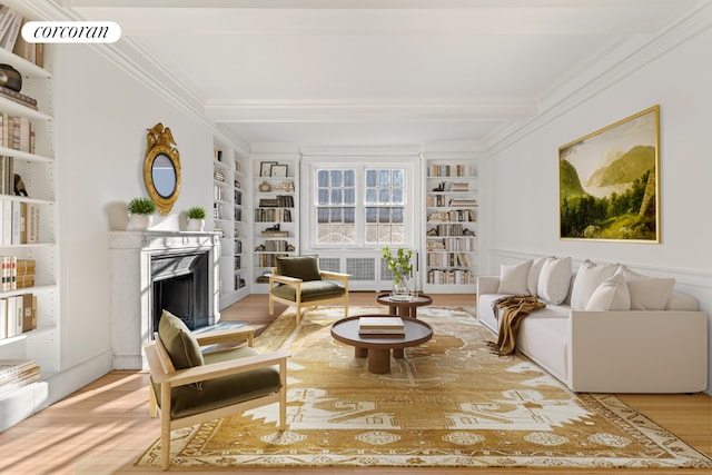 living room featuring a high end fireplace, built in features, beam ceiling, and light hardwood / wood-style floors