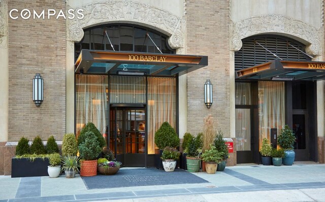 100 Barclay St Unit 11C, New York City, NY 10007 - doorway to property featuring brick siding