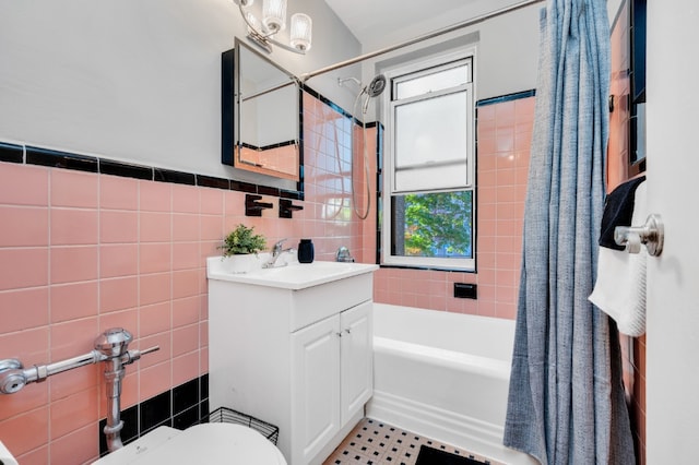 9707 4th Ave Unit 3R, New York City, NY 11220 - full bathroom with vanity, tile walls, and shower / bathtub combination with curtain