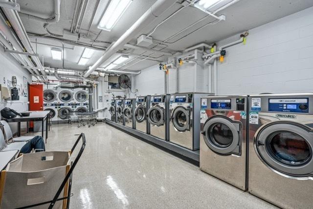 501 W 123rd St Unit 3A, New York City, NY 10027 - community laundry room featuring washer and clothes dryer and stacked washing machine and dryer