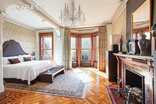 bedroom featuring radiator, wallpapered walls, crown molding, a fireplace with flush hearth, and an inviting chandelier