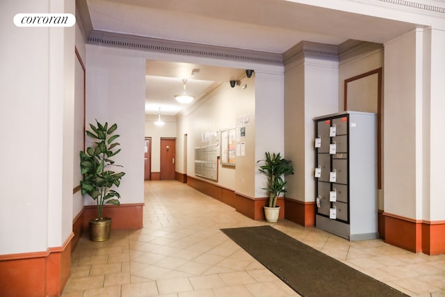 15 Fort Washington Ave Unit 6E, New York City, NY 10032 - community lobby featuring ornamental molding and a wainscoted wall
