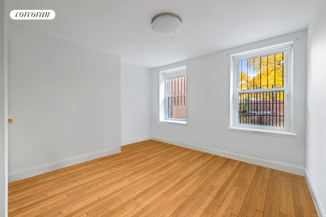 empty room featuring light hardwood / wood-style floors