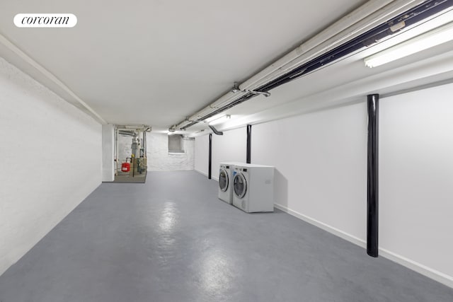 basement with washing machine and clothes dryer