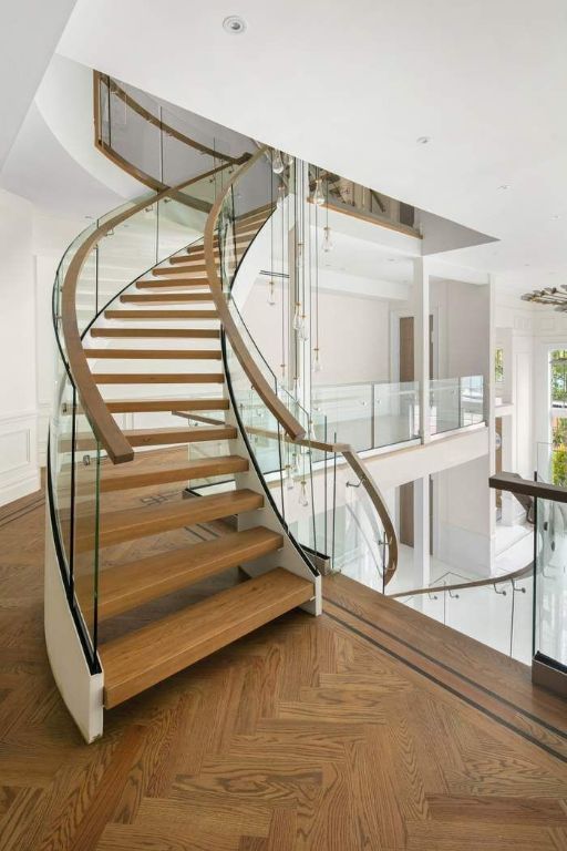 stairs featuring parquet floors