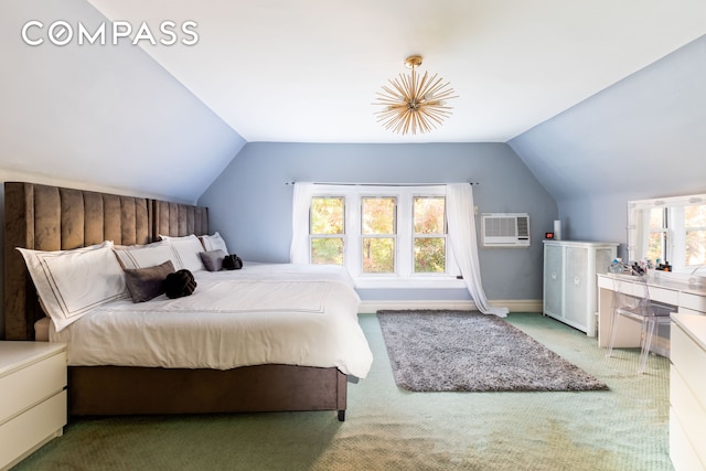 carpeted bedroom featuring lofted ceiling, a wall mounted air conditioner, and baseboards