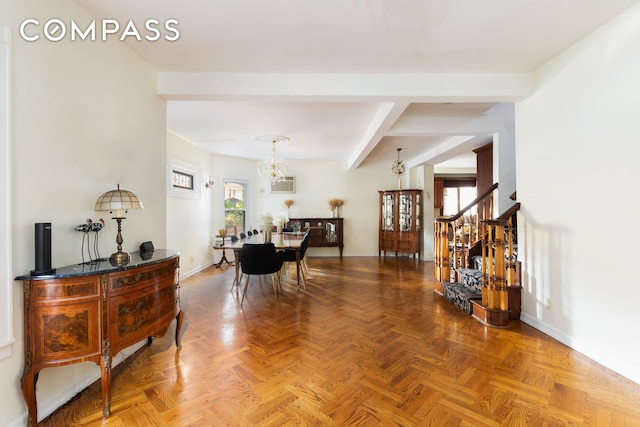 dining room featuring baseboards, stairs, a chandelier, and beam ceiling