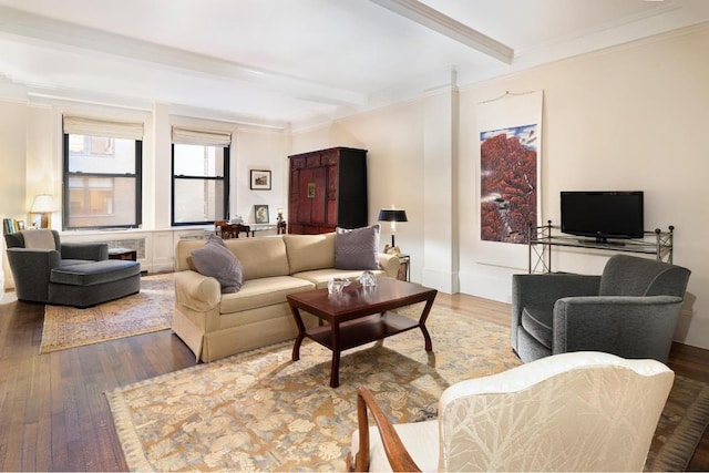 living room with hardwood / wood-style floors, ornamental molding, and beamed ceiling