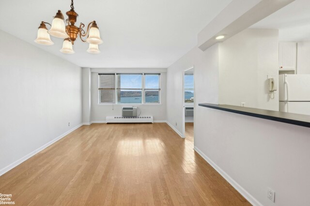 kitchen featuring white cabinetry, white appliances, ceiling fan, and decorative backsplash