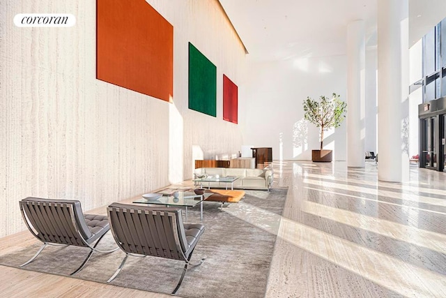 dining space with light wood-type flooring and expansive windows