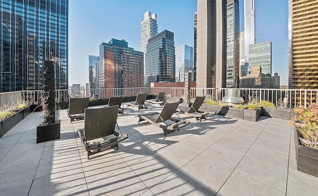 view of patio / terrace with a city view