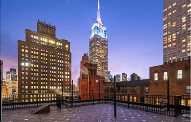 view of patio terrace at dusk