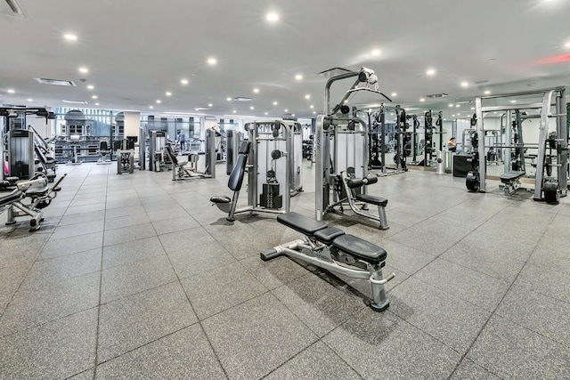 gym with visible vents and recessed lighting