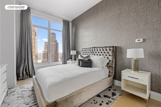 bedroom featuring light hardwood / wood-style floors