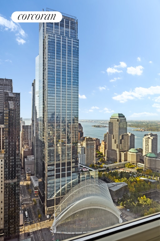 property's view of city featuring a water view