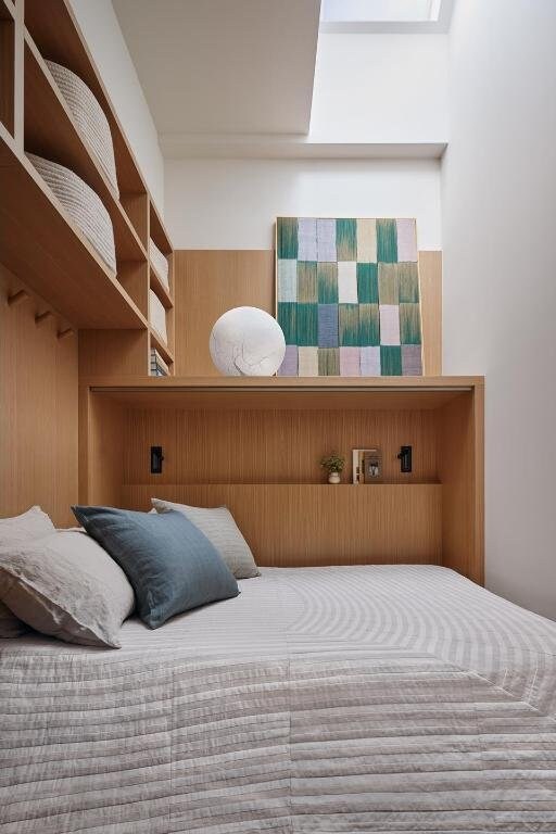 bedroom featuring access to exterior and hardwood / wood-style flooring