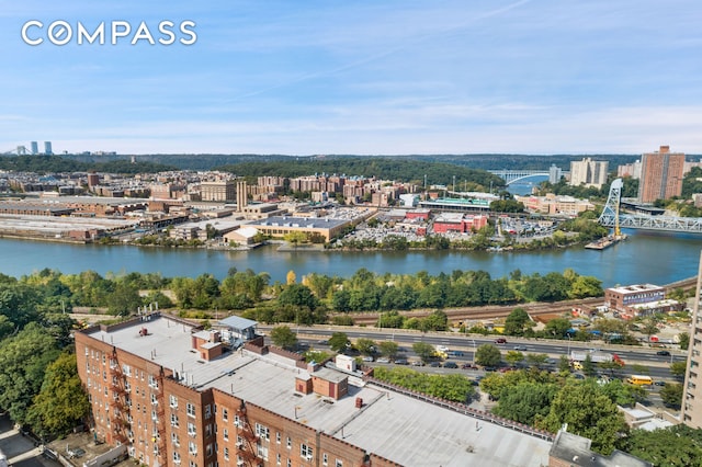 aerial view with a water view and a view of city