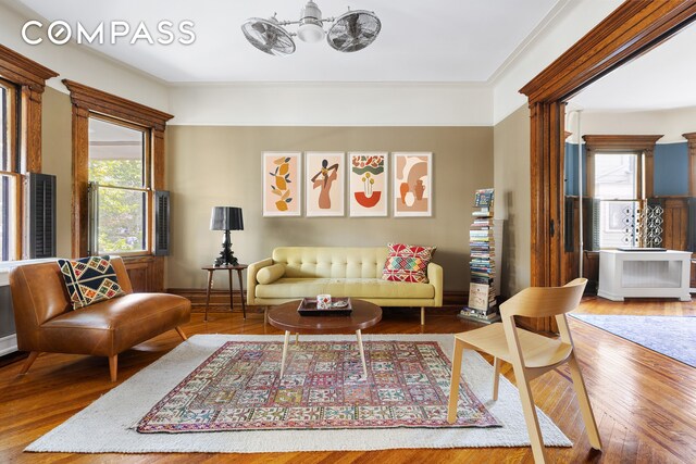 living room with hardwood / wood-style flooring and a wealth of natural light