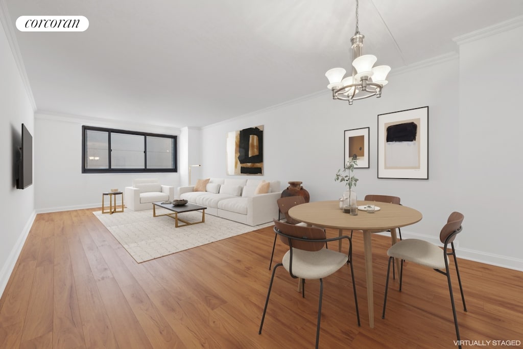 dining room featuring visible vents, crown molding, an inviting chandelier, and wood finished floors