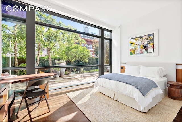 bedroom with wood finished floors