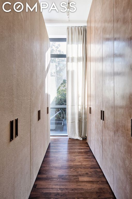 hallway featuring dark hardwood / wood-style floors