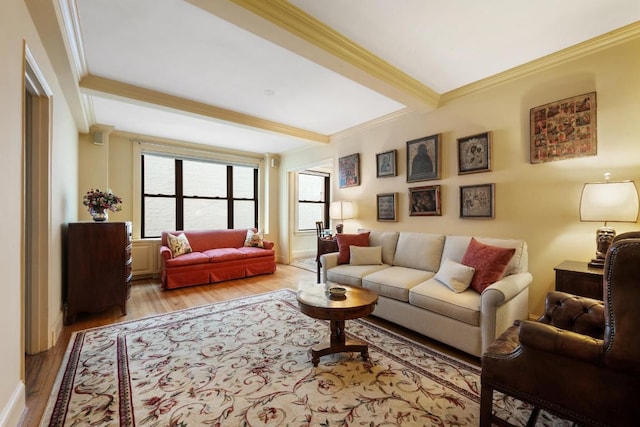 living room with crown molding, beam ceiling, and light wood-type flooring