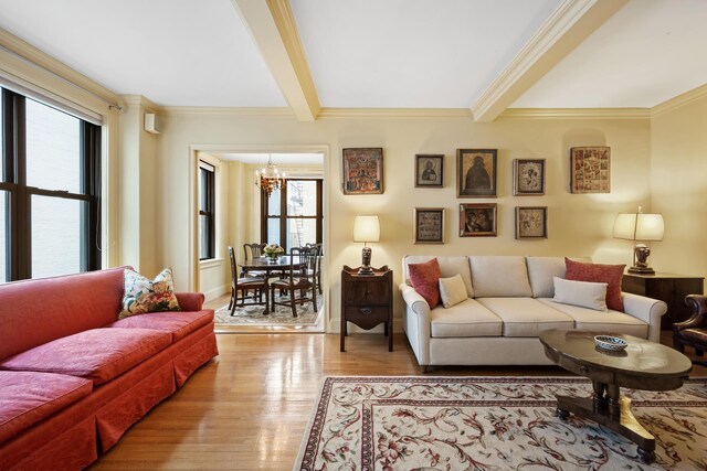 12 E 97th St Unit 8E, New York City, NY 10029 - living room featuring light wood-style flooring, crown molding, and beamed ceiling