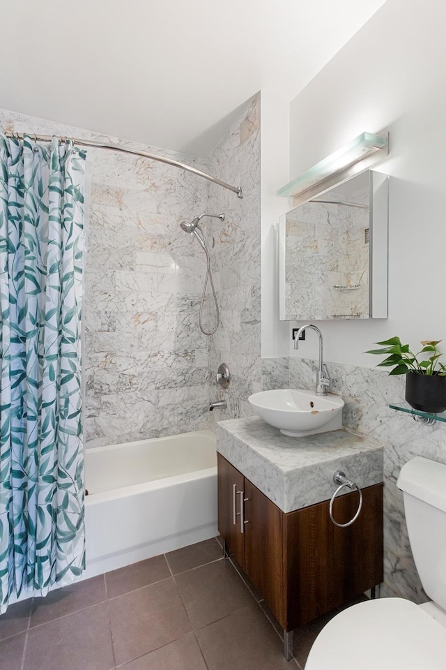 full bath featuring shower / tub combo with curtain, vanity, toilet, and tile patterned floors