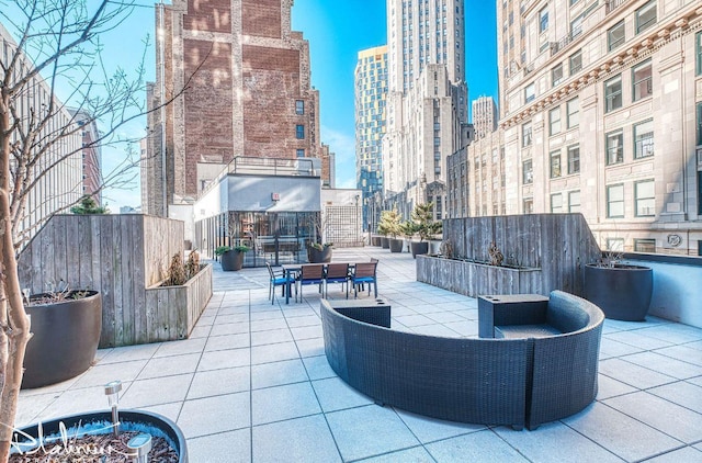 view of patio with a view of city