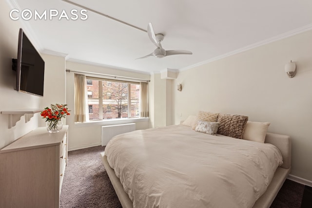 bedroom featuring crown molding, baseboards, and carpet flooring