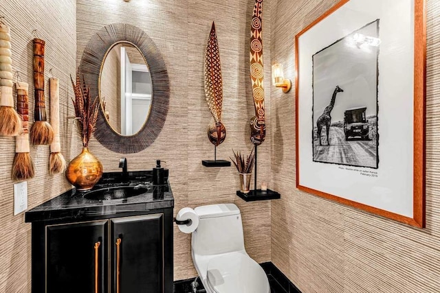 bathroom with vanity and toilet