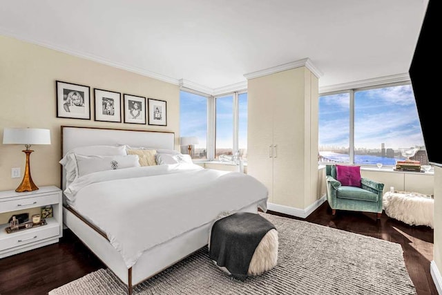 bedroom with multiple windows, wood finished floors, and ornamental molding