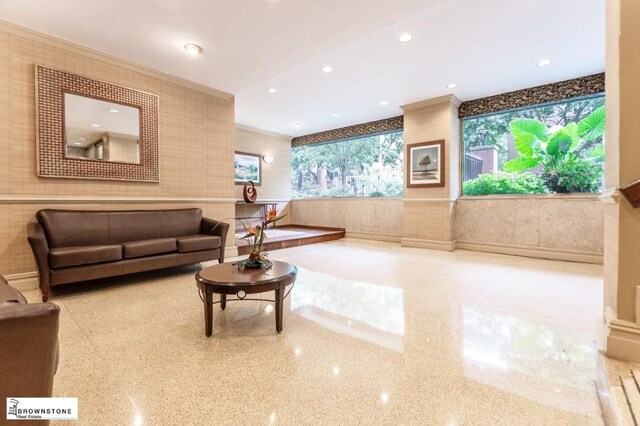 kitchen with white cabinetry, light tile patterned floors, white appliances, and decorative backsplash