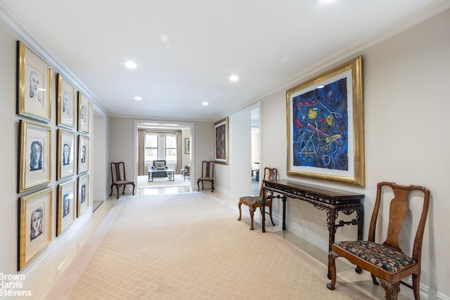 sitting room featuring recessed lighting, crown molding, and baseboards