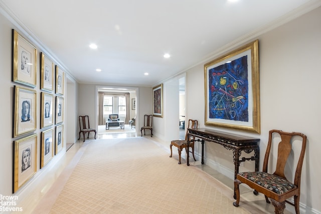 living area featuring crown molding, recessed lighting, baseboards, and light colored carpet