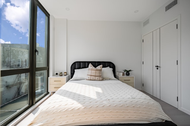 11-52 44th Dr Unit 2-A, New York City, NY 11101 - bedroom featuring wood finished floors