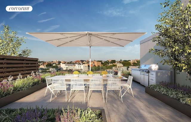 view of patio / terrace with exterior kitchen, outdoor dining space, and a grill