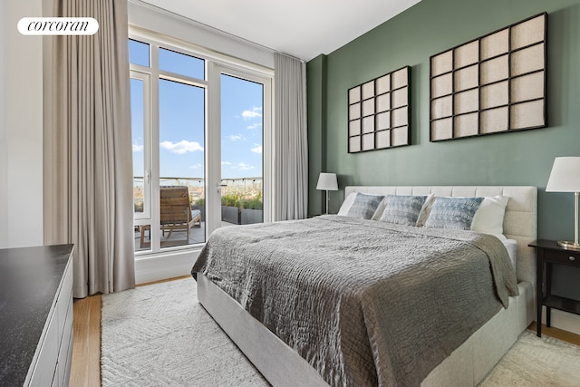 bedroom featuring wood finished floors