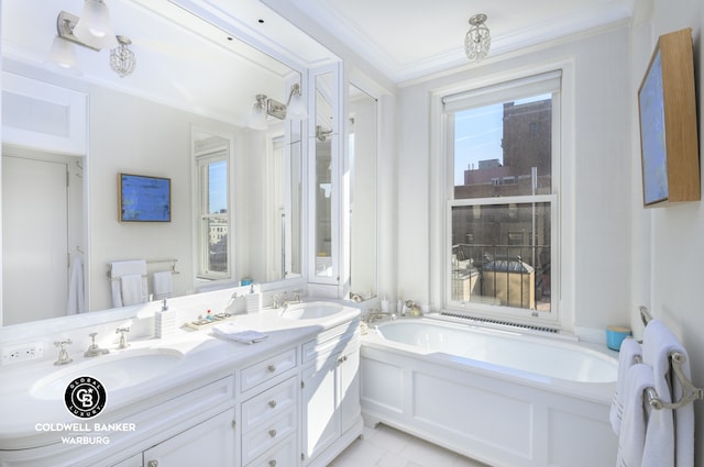bathroom with a bath, double vanity, and ornamental molding