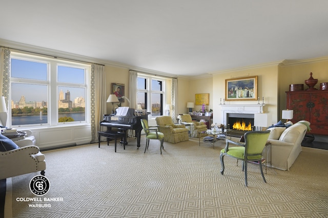 carpeted living room with plenty of natural light, ornamental molding, and a lit fireplace