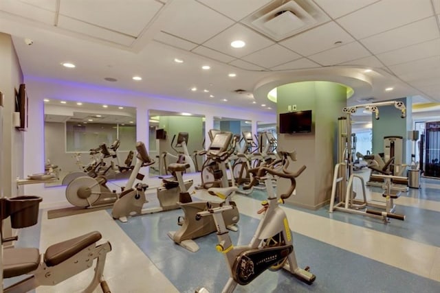 workout area featuring a drop ceiling